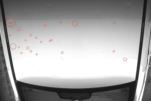 AI hail and dent detection on a vehicle roof, every defect marked and located